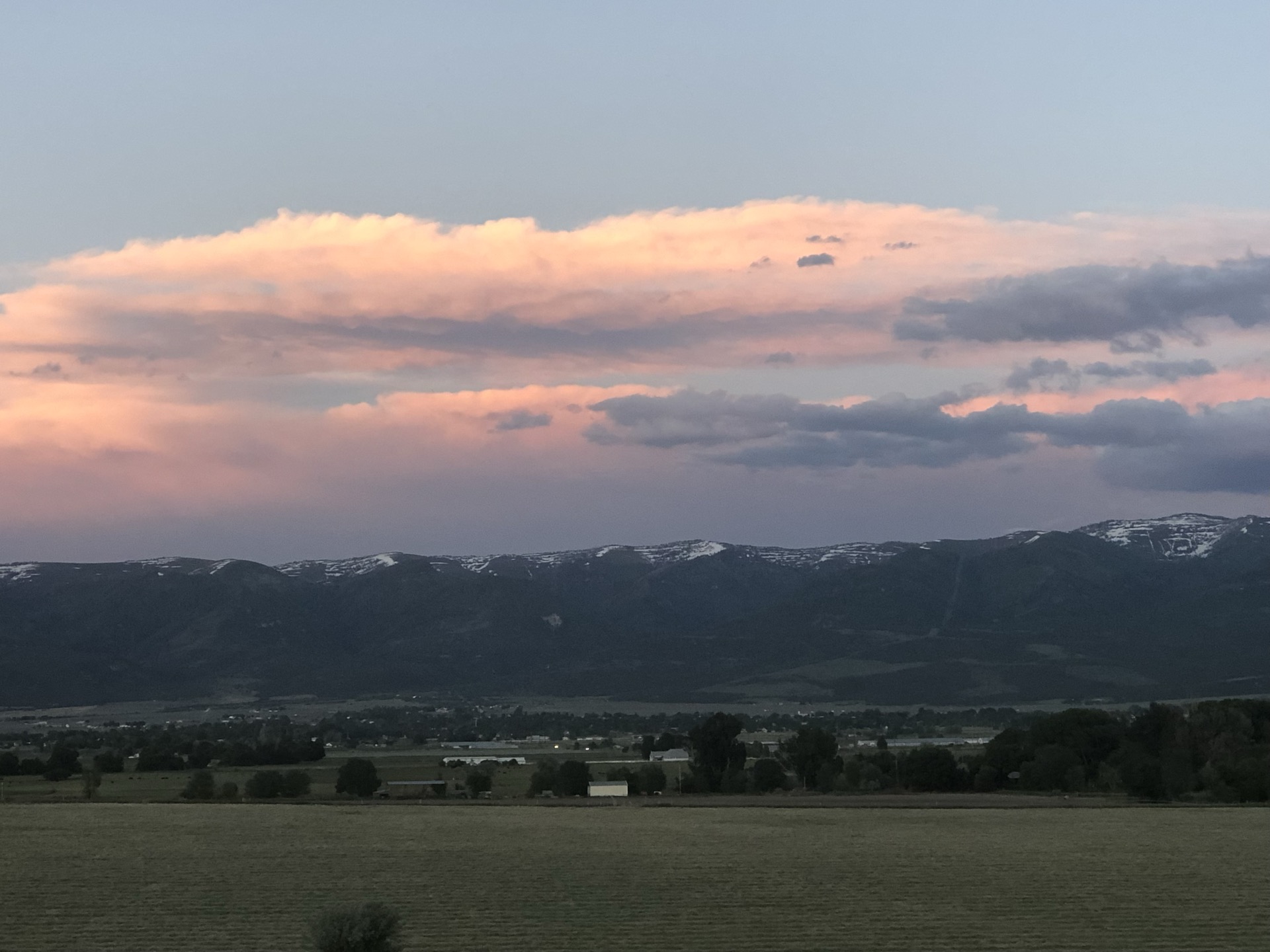 Circle 7 rangeland near Mt. Pleasant, Utah — snow-capped mountains at sunset